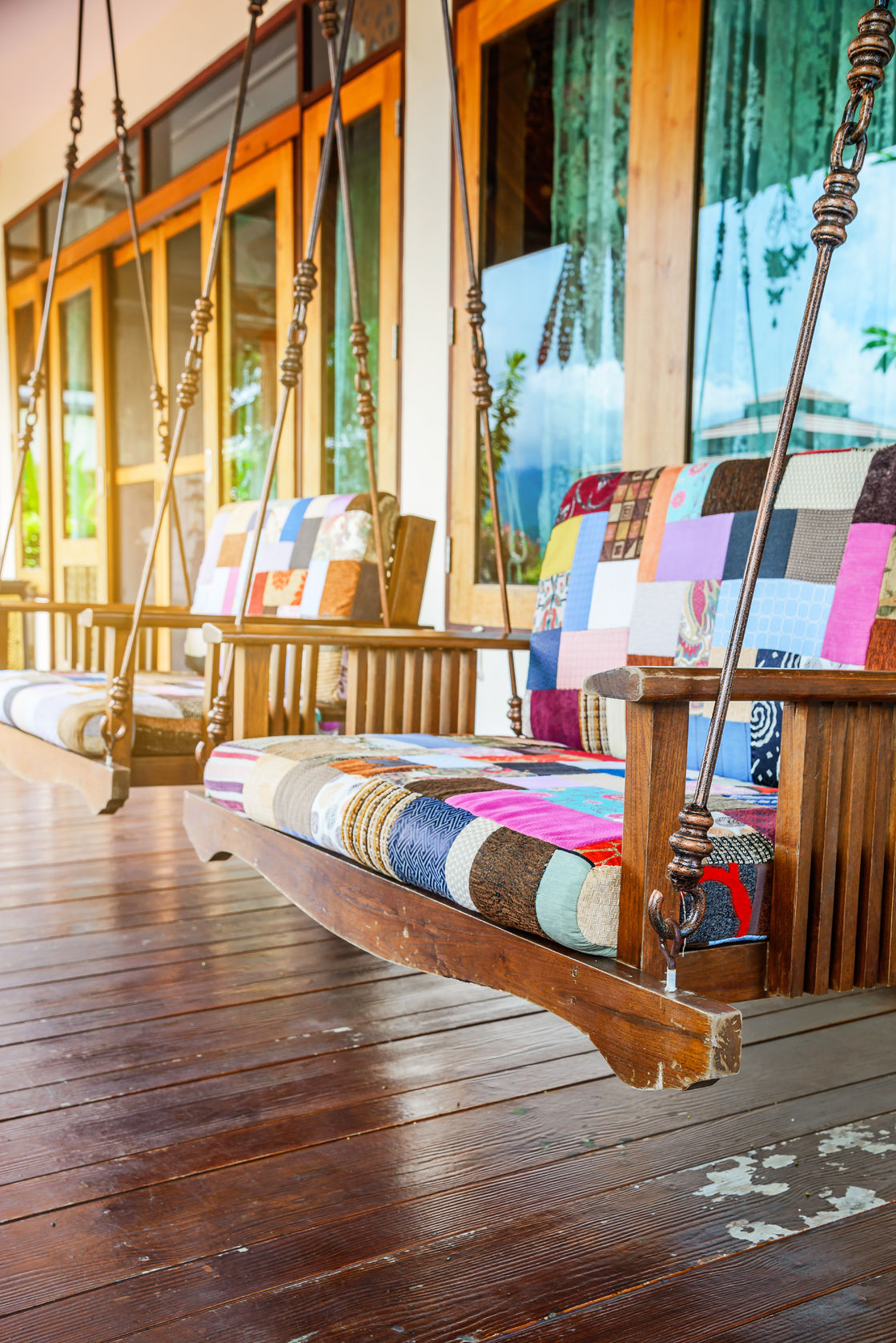 wooden swinging bench